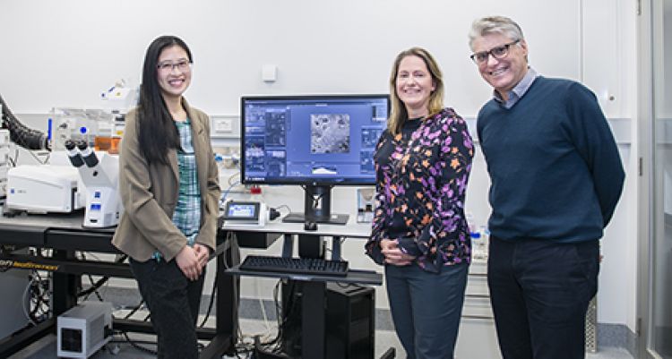 Three researchers in the Imaging facility