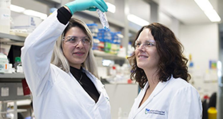 Two female researchers in a laboratory